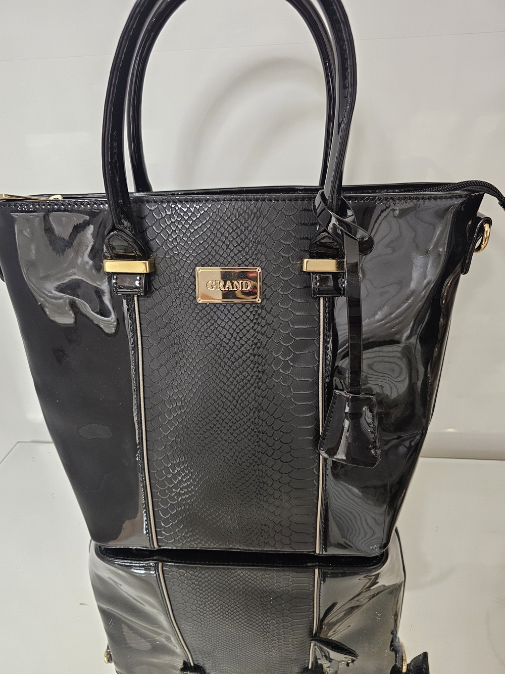 Grand Black Patent Tote with Snake-Embossed Center